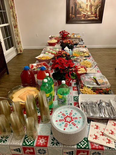 A festive table filled with a variety of snacks and drinks, perfect for a holiday gathering.