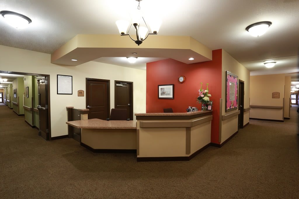 A welcoming reception area with a desk and seating.