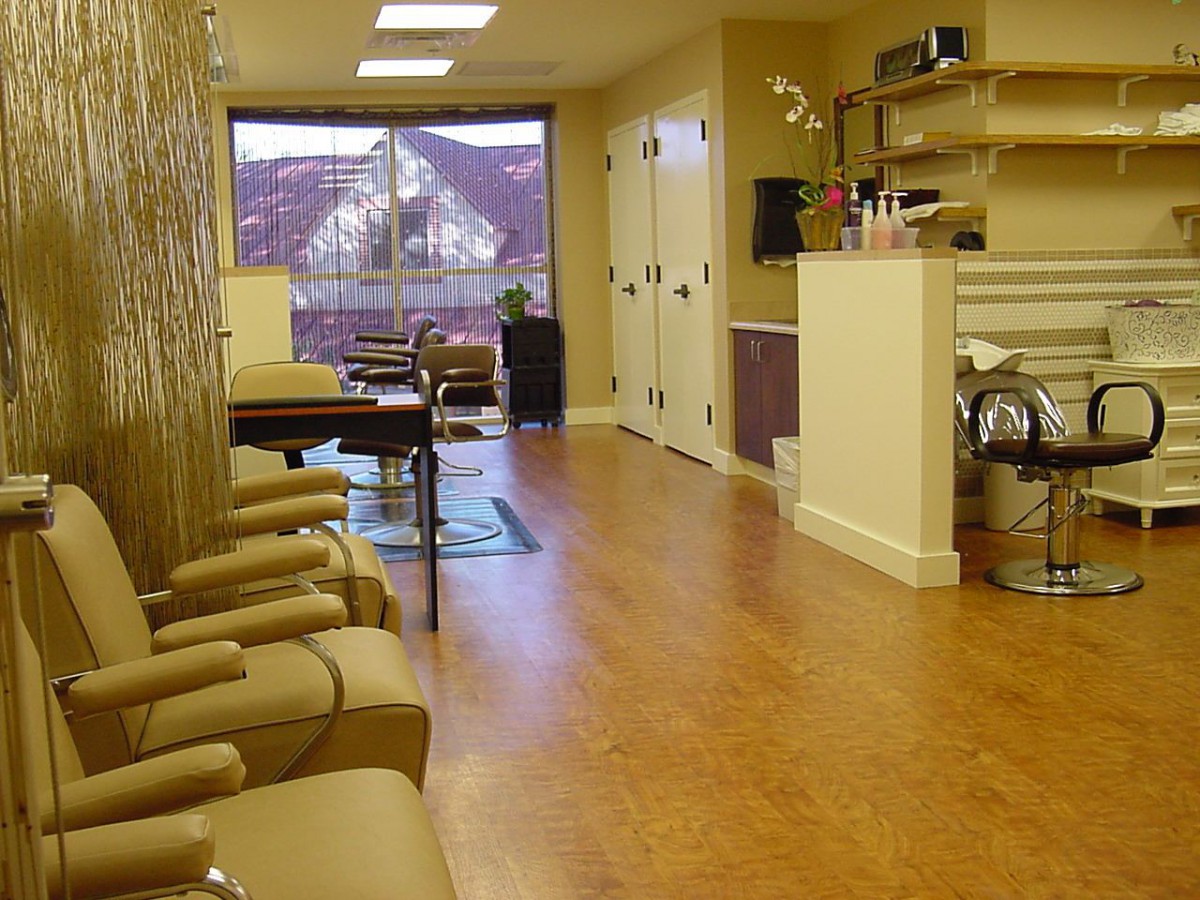 A cozy waiting room with comfortable seating and a scenic window view.