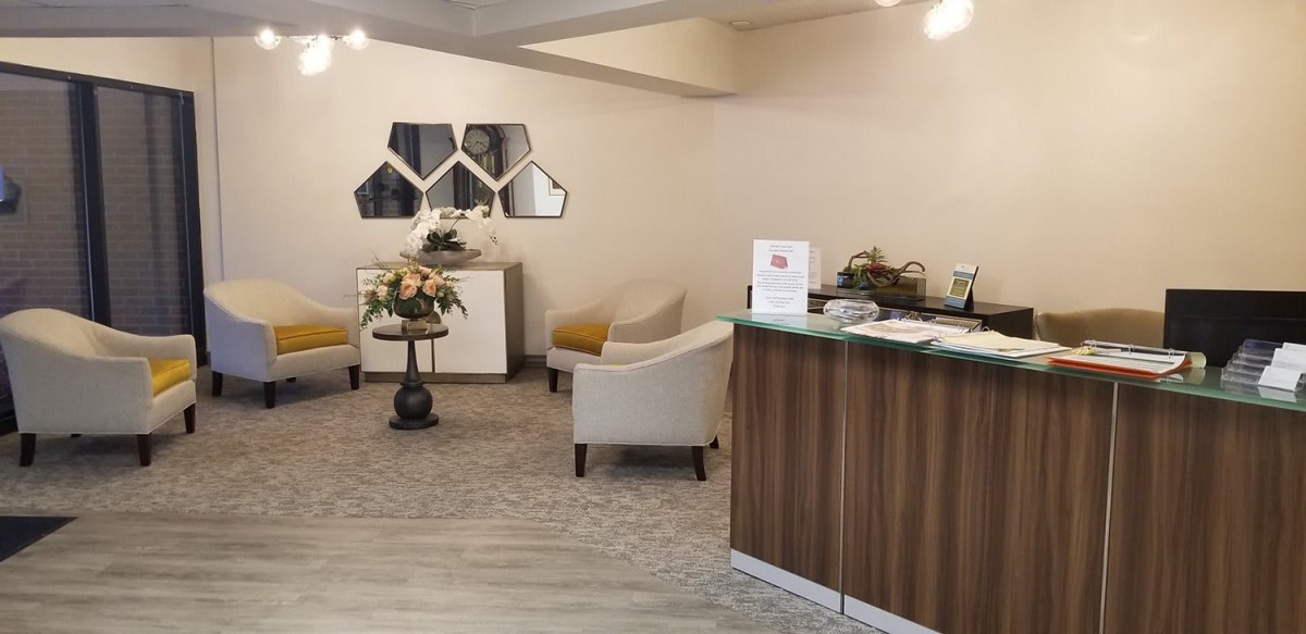 A modern reception area with comfortable seating and stylish decor.