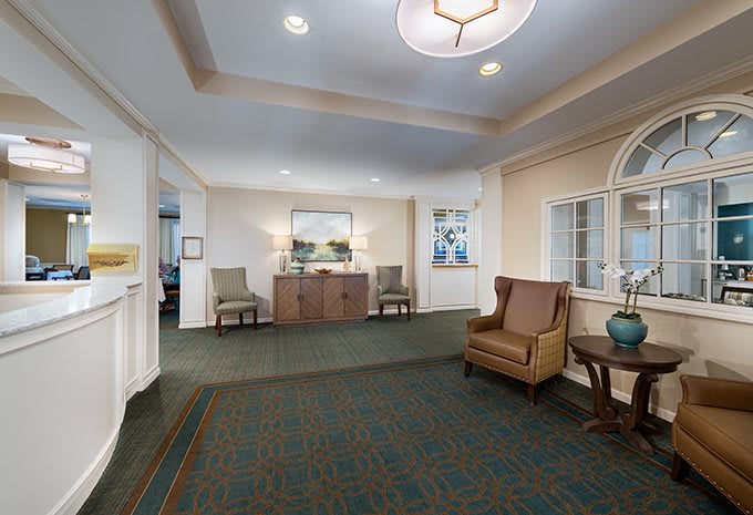 A cozy lobby area with comfortable seating and elegant decor.