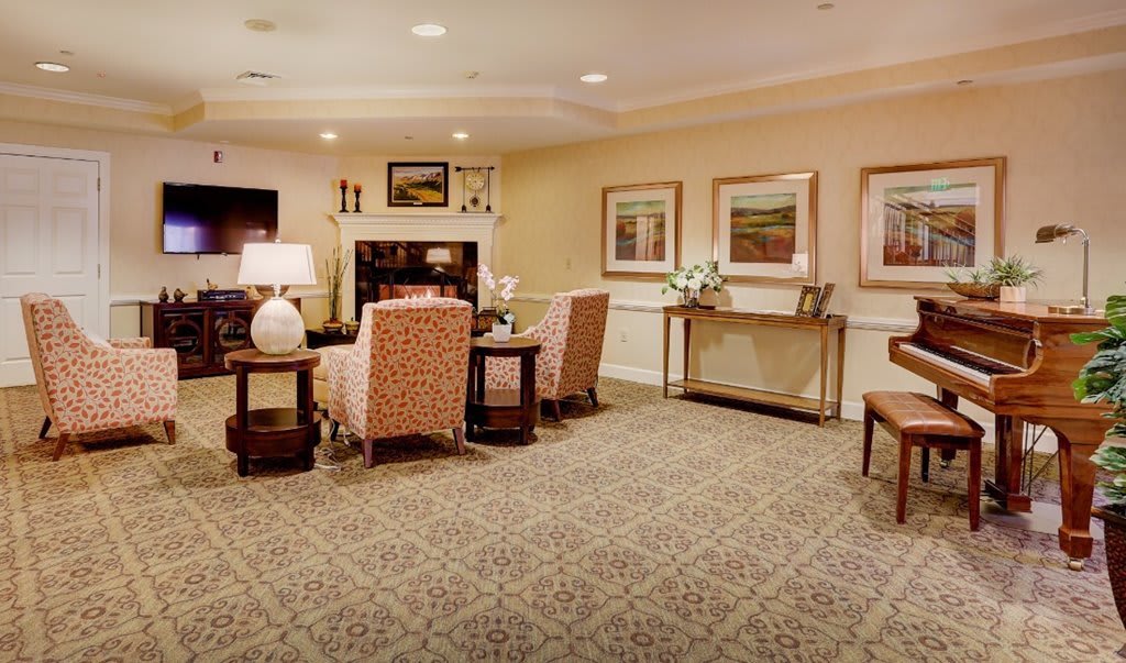A cozy living room with modern decor and comfortable seating.