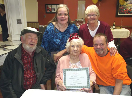 A heartwarming family gathering celebrating a special achievement.