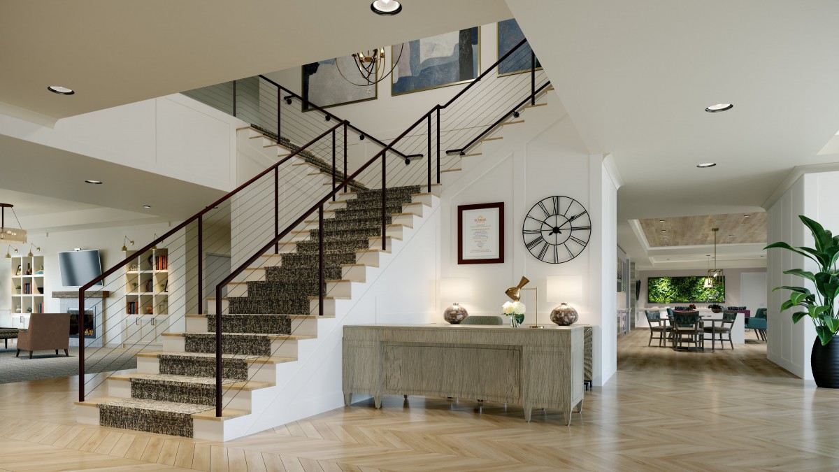 A modern home interior featuring a stylish staircase with a console table and wall clock.
