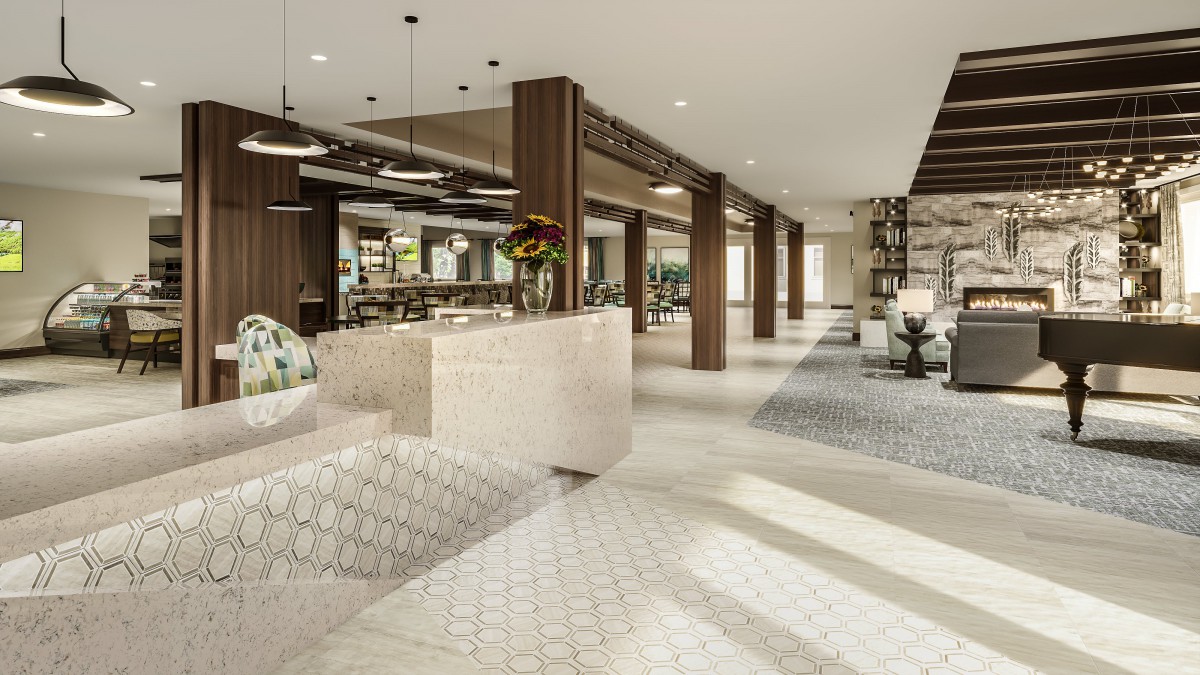 A modern lobby with a reception desk, stylish furniture, and elegant lighting.