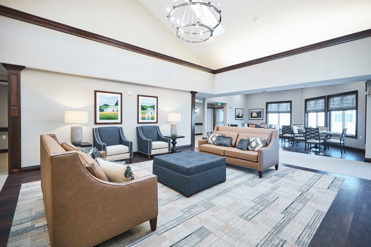 A modern living room with stylish furniture and elegant decor.