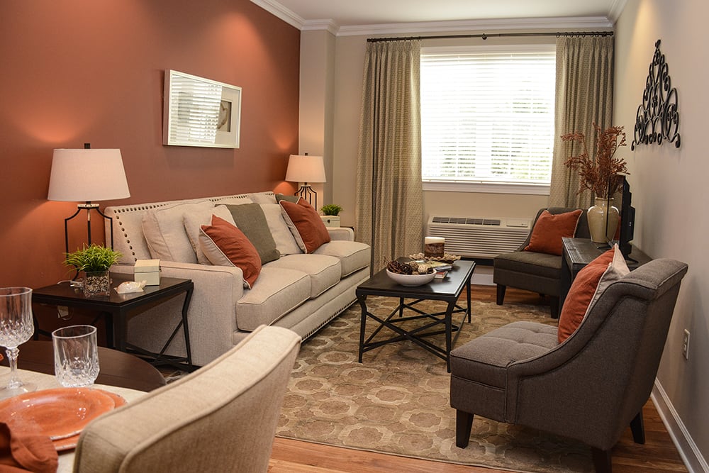 A cozy living room with neutral tones and stylish decor.
