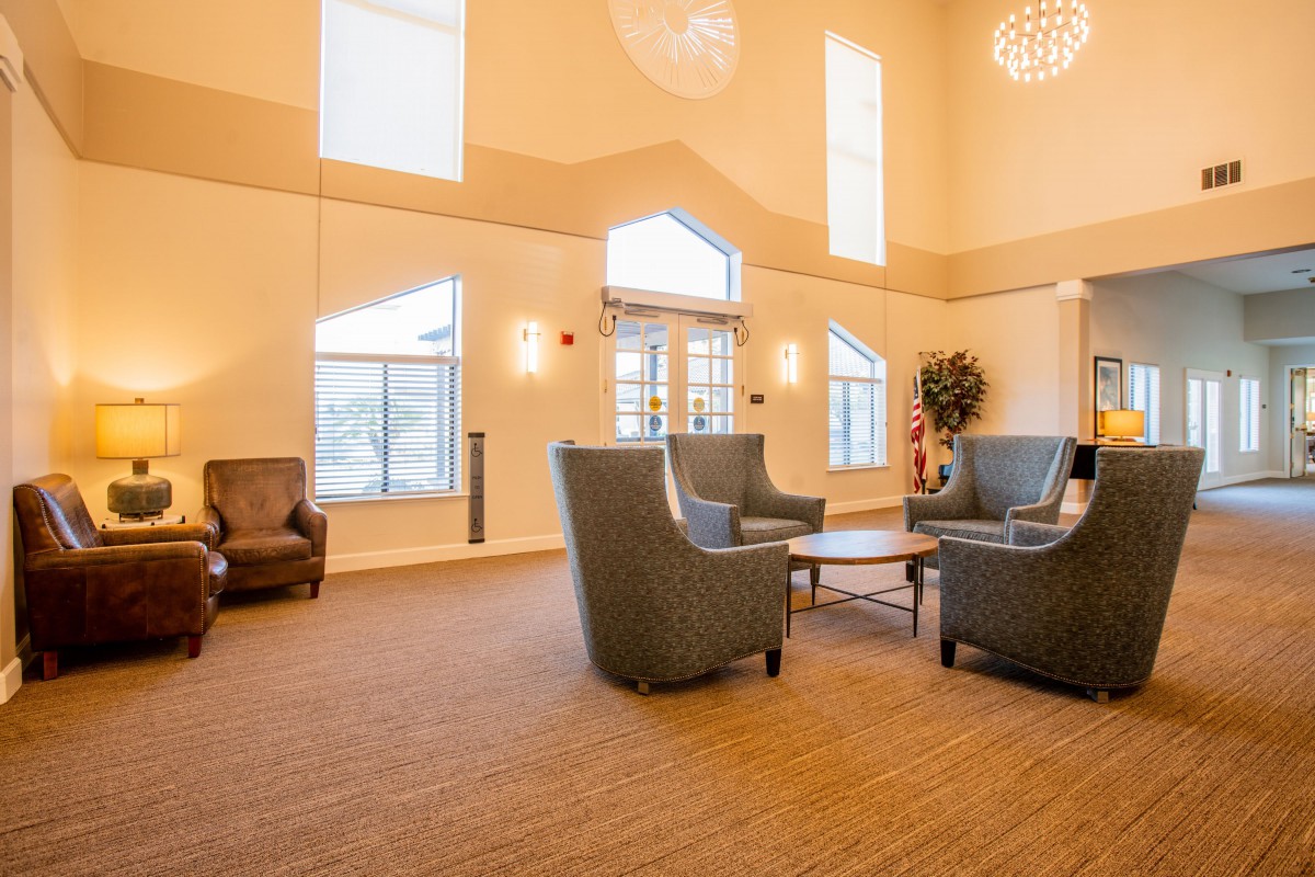 Spacious lobby with comfortable seating and natural lighting.