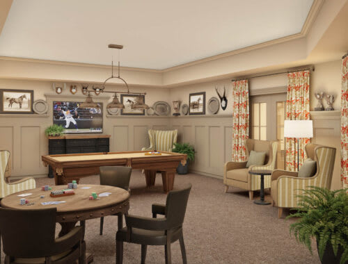 A cozy living room with a pool table, television, and comfortable seating.
