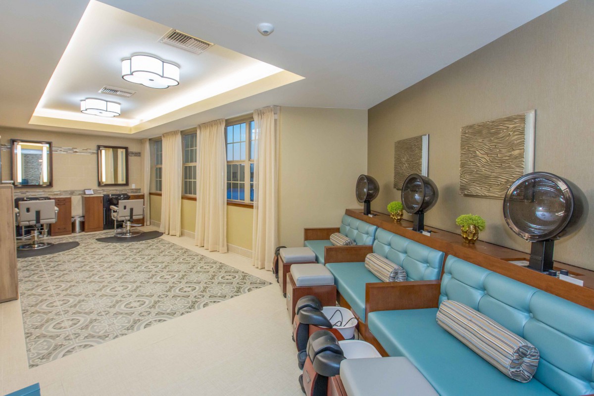 A modern waiting area with stylish seating and elegant lighting fixtures.