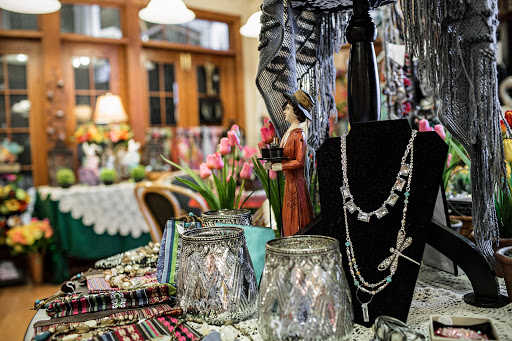 A charming display of jewelry and decorative items in a cozy shop setting.