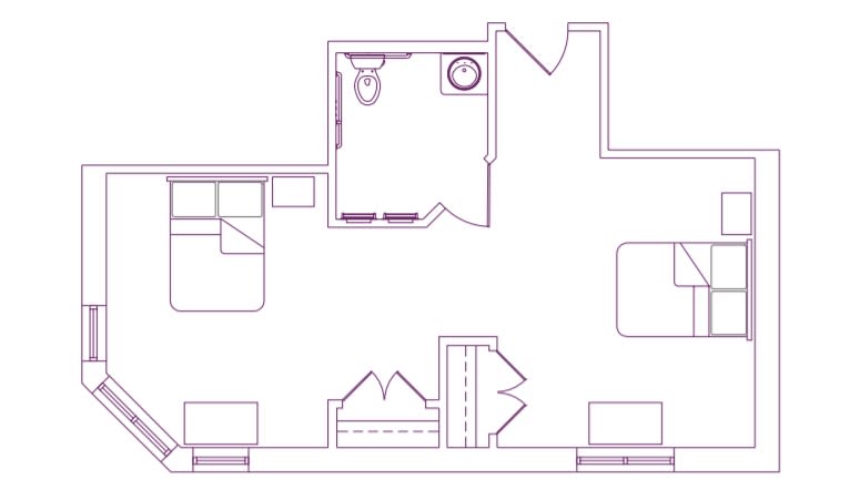 A simple floor plan layout showing room and hallway arrangements.