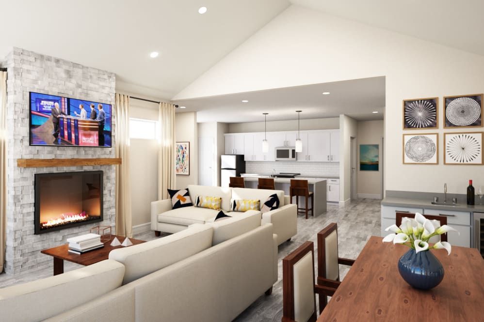Modern open-concept living room with a view of the kitchen and dining area.