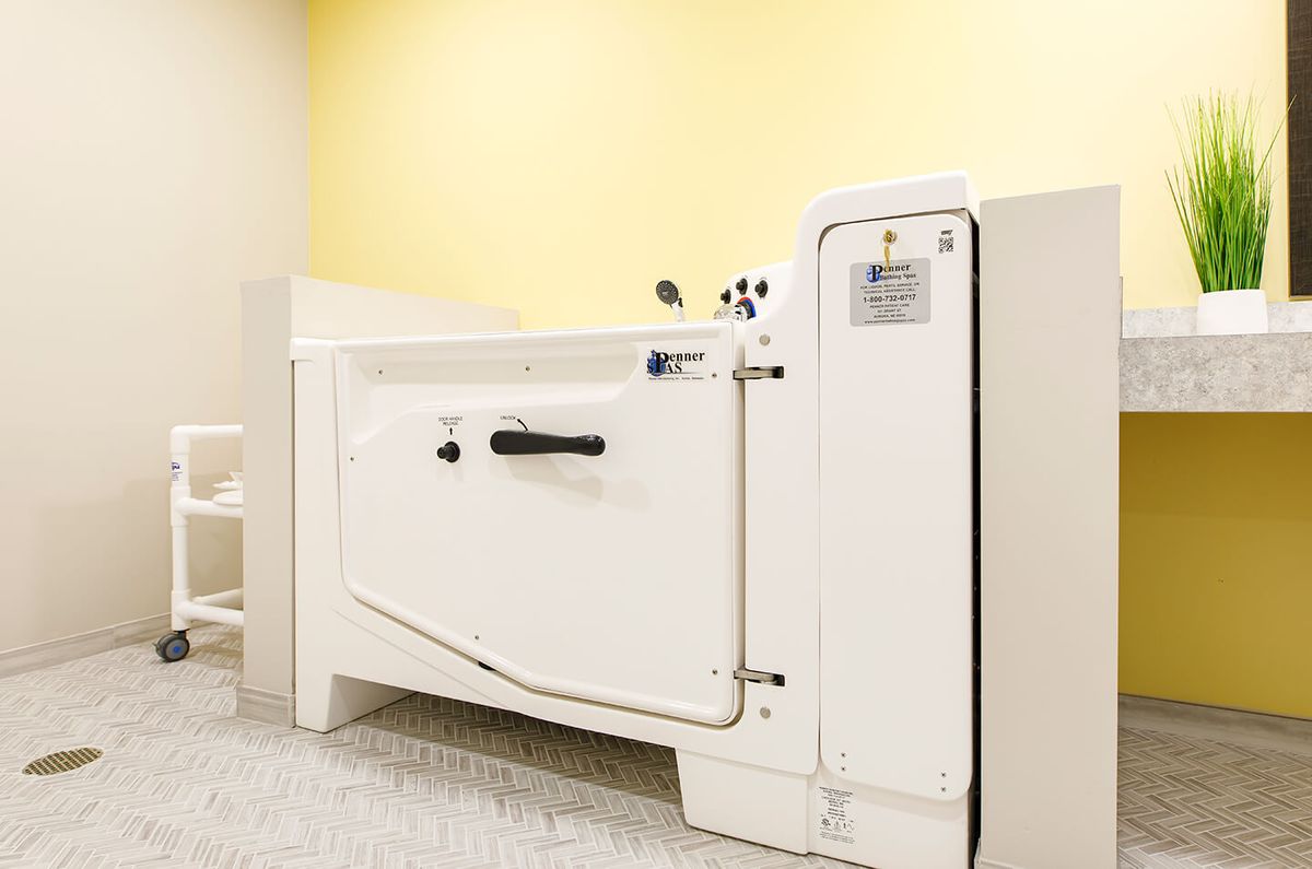 An accessible walk-in bathtub designed for ease of use and safety, ideal for senior care.