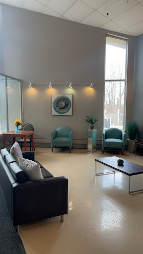 A stylish and modern lounge area featuring comfortable seating and contemporary decor.