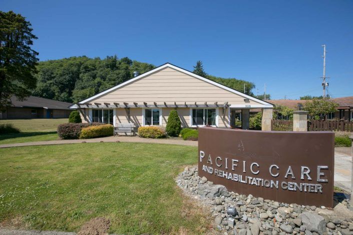 Pacific Care Rehabilitation Center with landscaped surroundings.