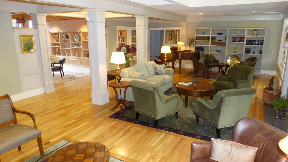 A cozy living room with comfortable seating and soft lighting.