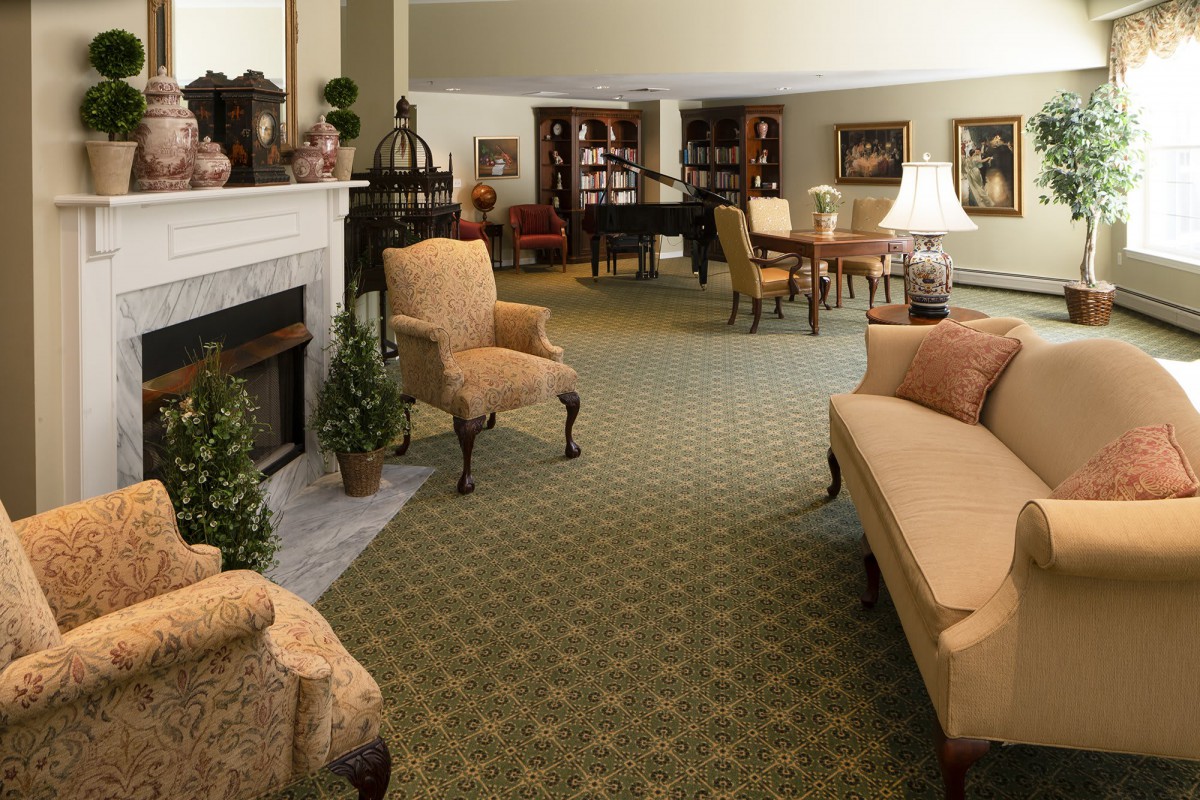 Cozy living room with a fireplace and comfortable seating area.