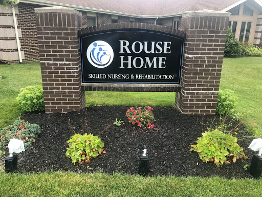 Entrance sign for Rouse Home, a facility offering skilled nursing and rehabilitation services.