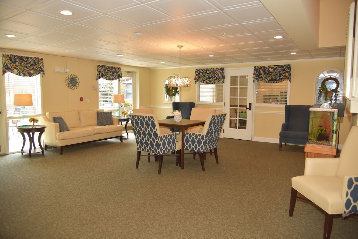 A cozy living room with stylish furniture and a comfortable seating area.