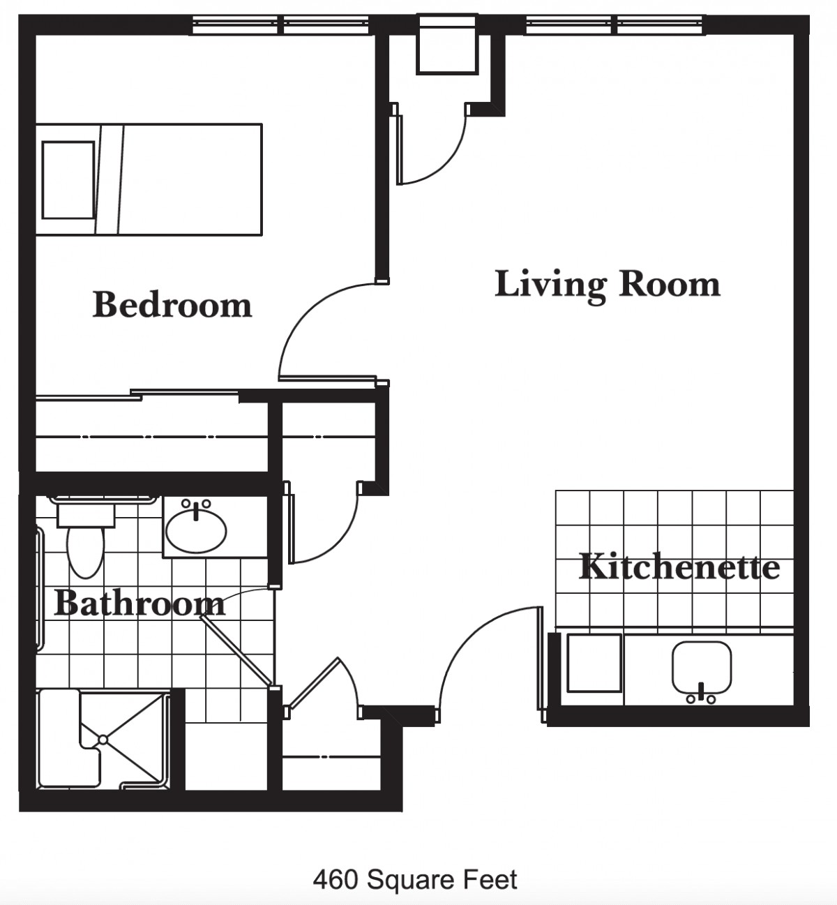 A simple floor plan of a one-bedroom apartment with a living room, bathroom, and kitchenette.