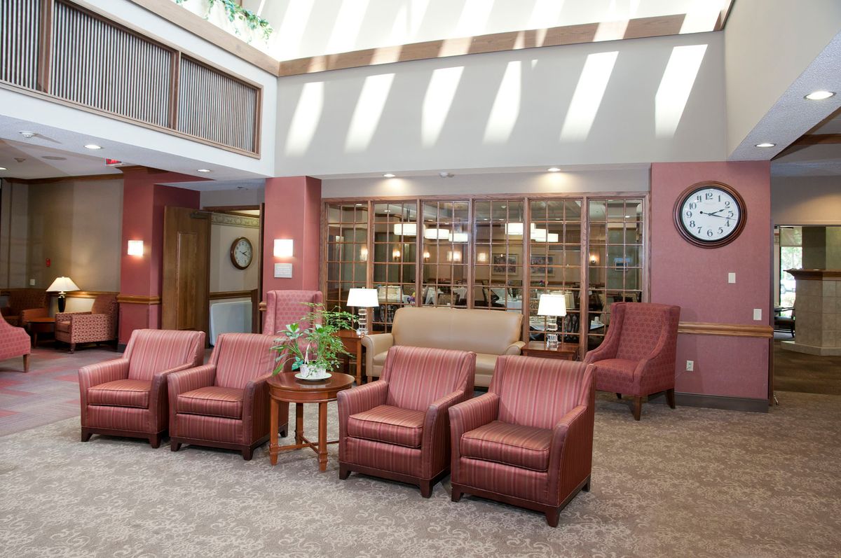 A well-lit lobby with comfortable seating and modern decor.