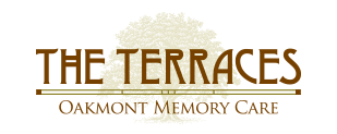A stylized logo featuring a large tree with text overlaying it.