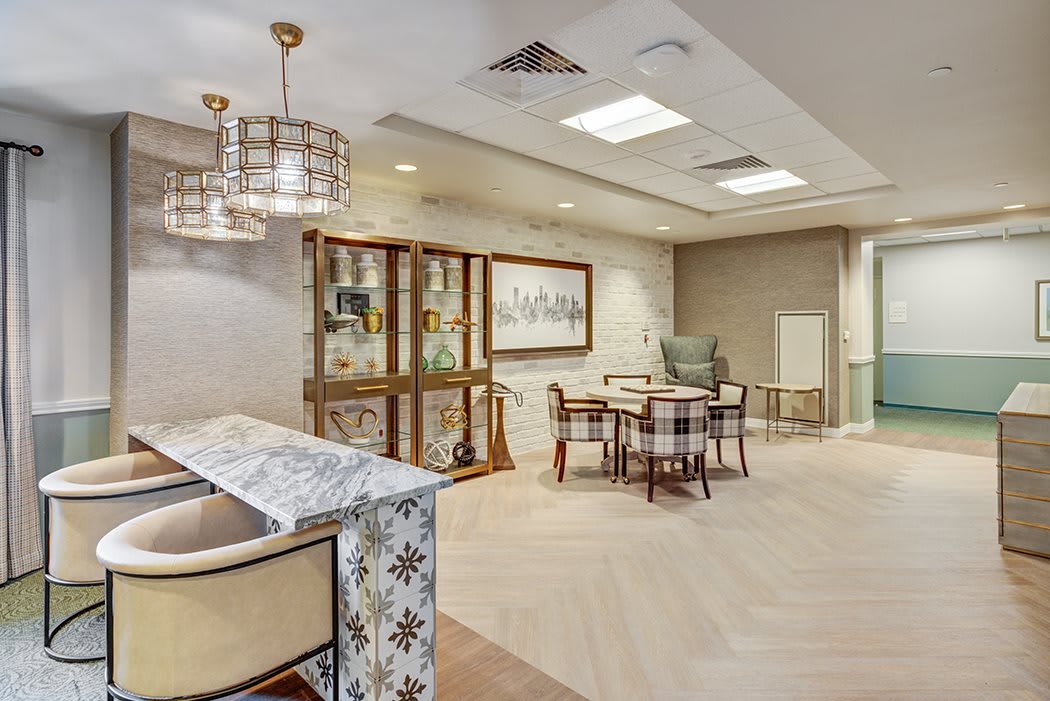 A modern living room with elegant furnishings and decor.