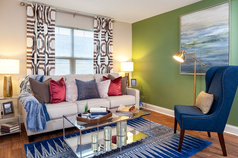 Cozy living room with vibrant decor and modern furnishings.