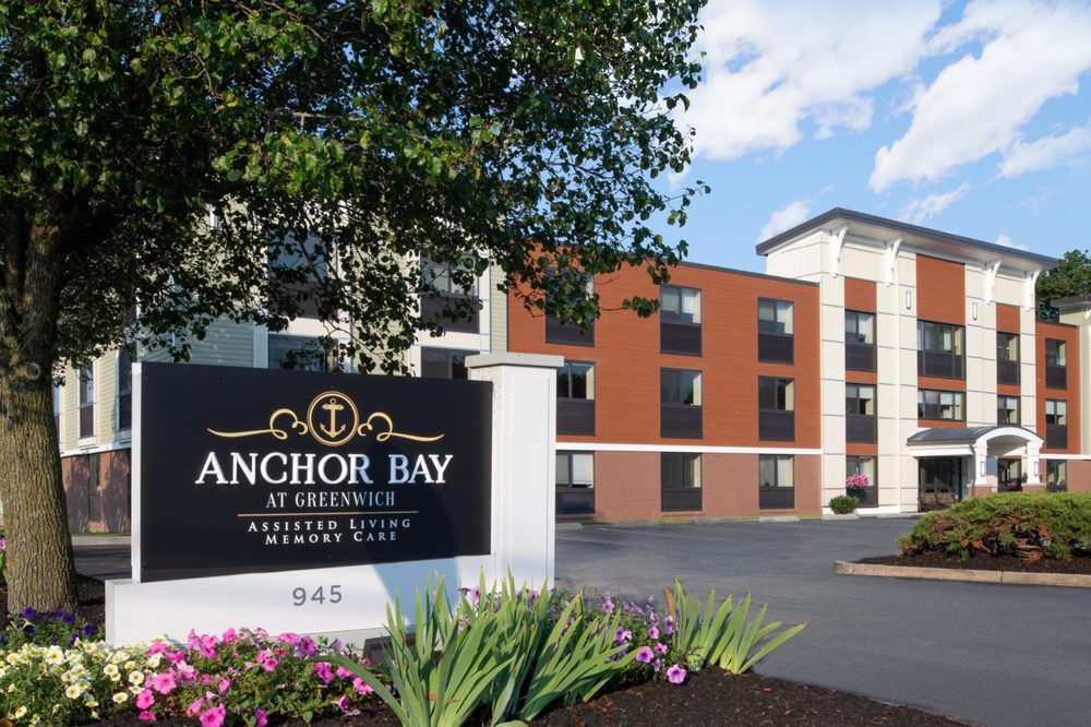 The exterior view of Anchor Bay with lush landscaping.