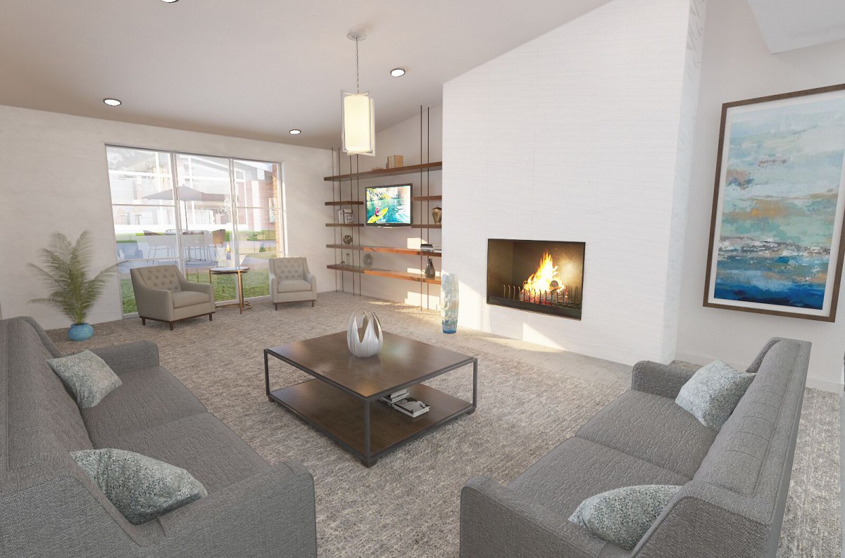 A modern living room with a cozy fireplace and contemporary furnishings.