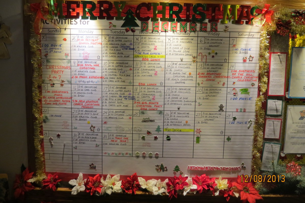 A festive holiday schedule board illuminated with Christmas decorations and lights.