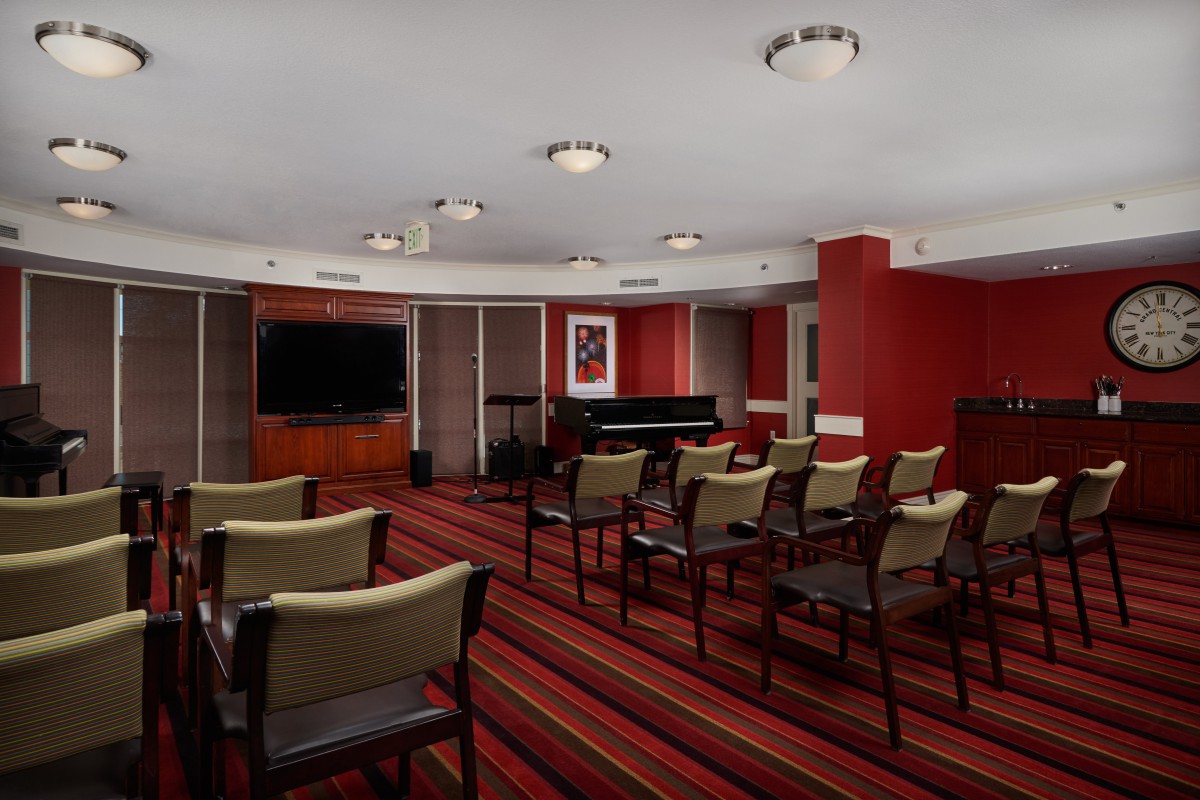A well-equipped meeting room with a modern conference setup.