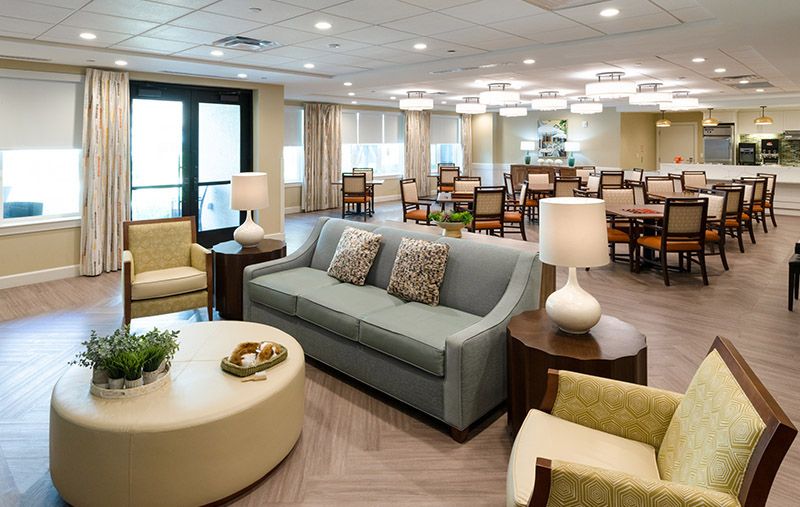 A modern and spacious living area with comfortable seating and elegant decor.
