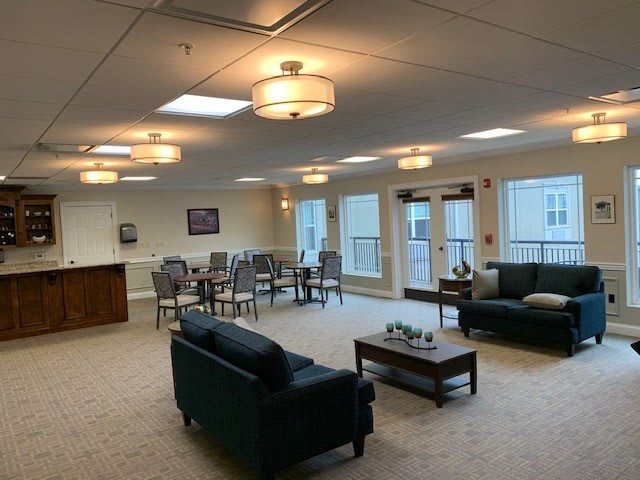 Spacious living room with comfortable seating and natural light.