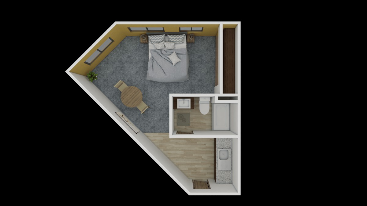 A floor plan of a bedroom and bathroom with angled walls.