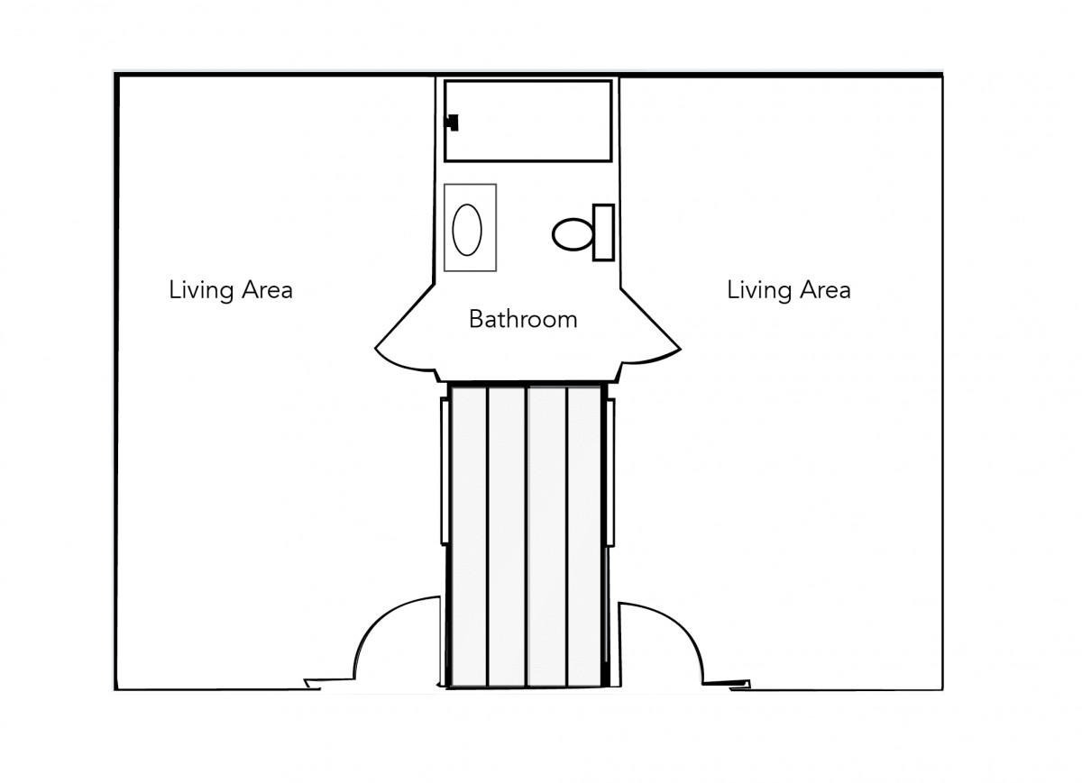 A simple floor plan showing a central bathroom flanked by two living areas.