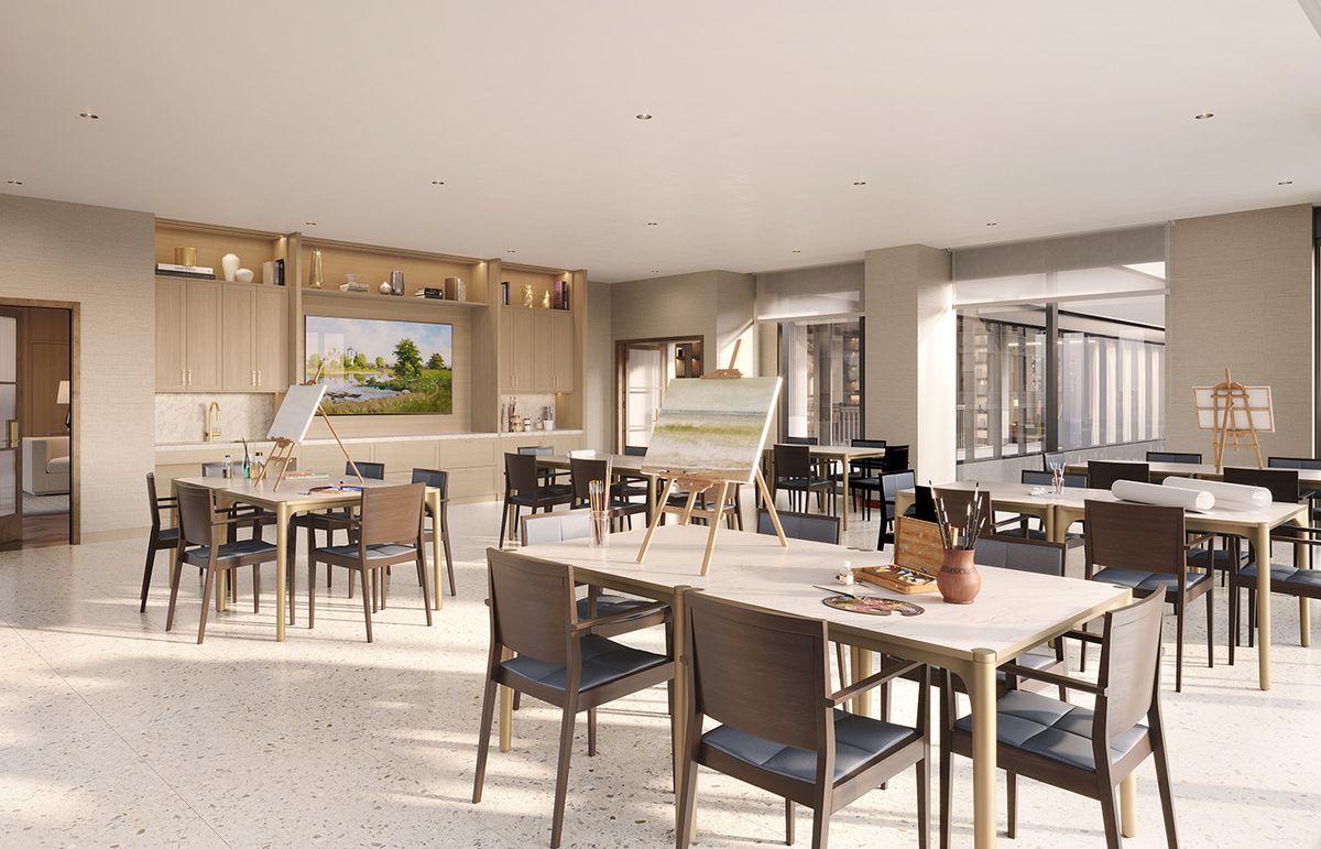A modern dining area with neatly arranged tables and chairs, featuring a bar and abundant natural light.