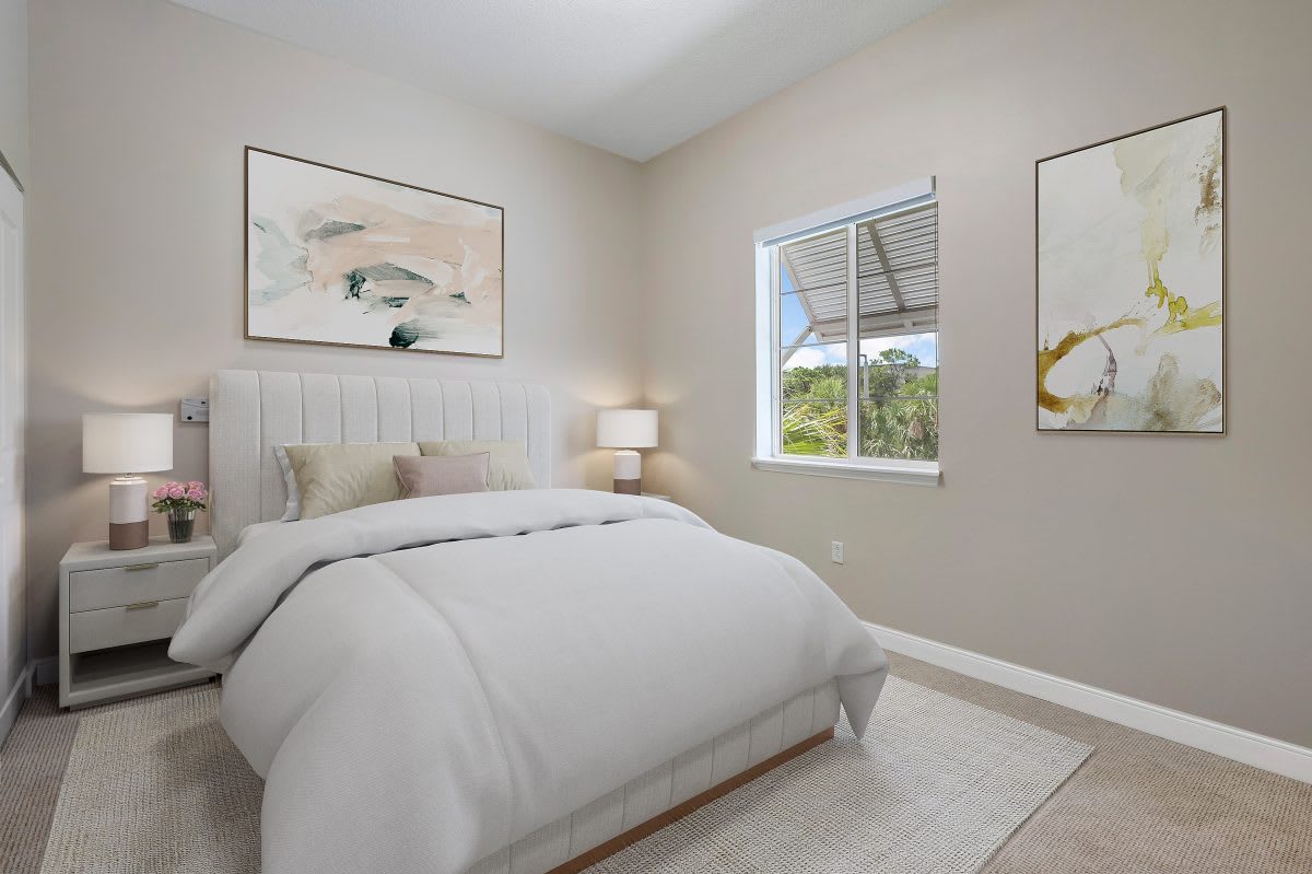 A minimalist bedroom with a comfortable bed and soft lighting.