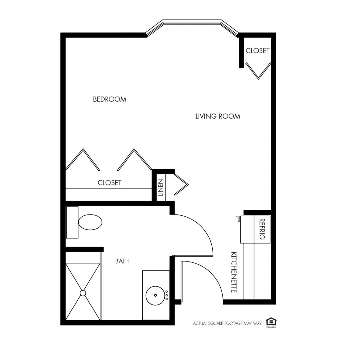 A floor plan of a studio apartment featuring a combined living and bedroom area, kitchen, and bathroom.
