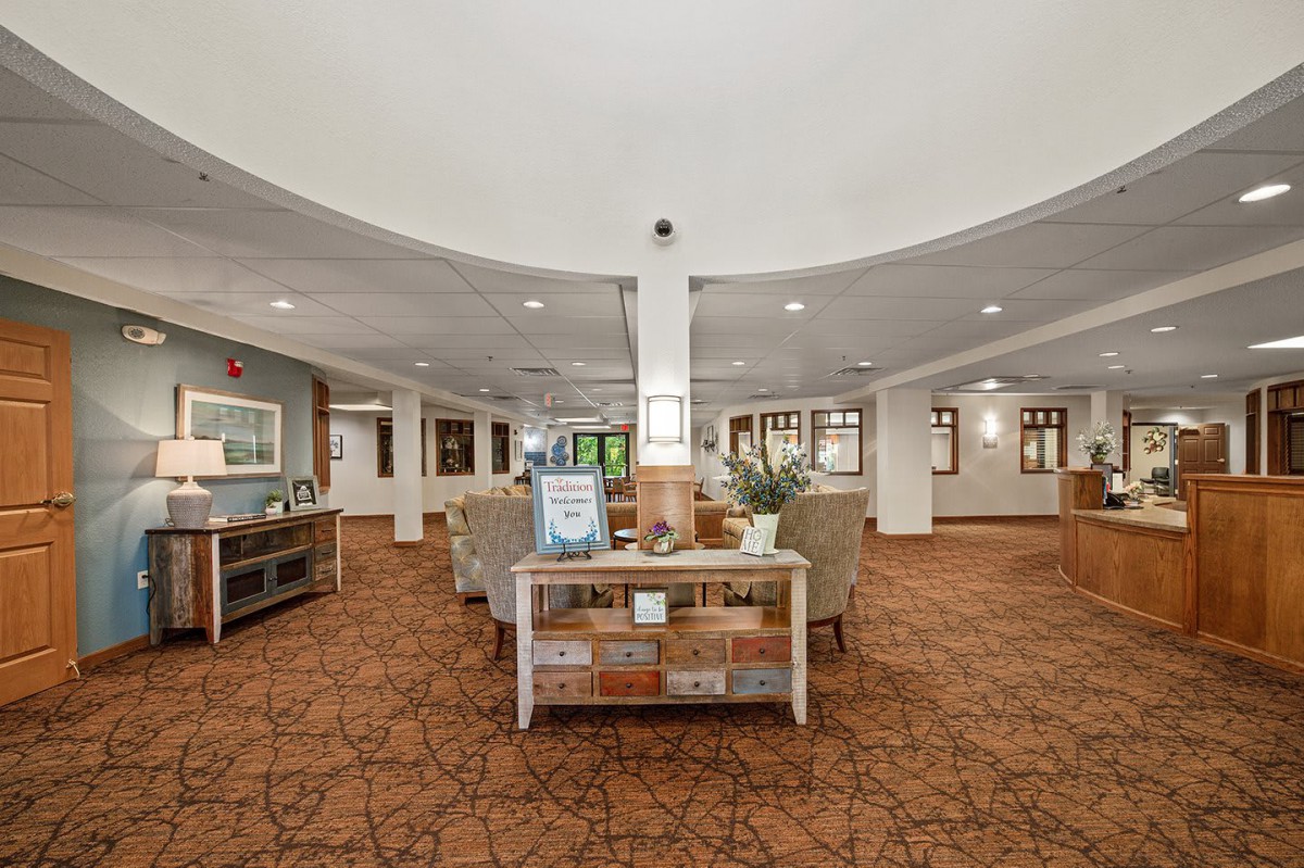 Spacious hotel lobby with comfortable seating and modern decor.