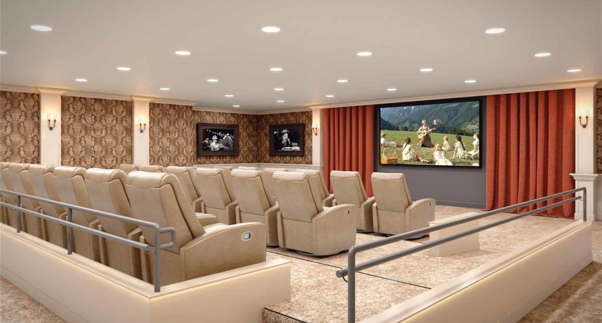A luxury home theater with comfortable seating and a large projector screen.