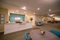 A modern and spacious reception area with a seating arrangement.