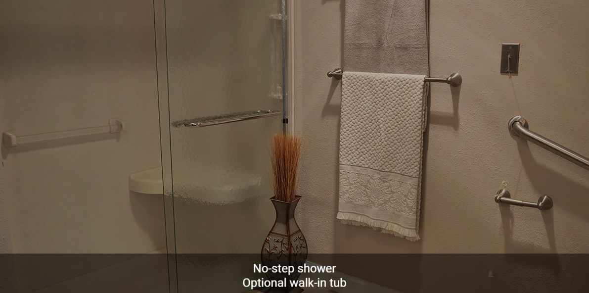 A bathroom featuring a no-step shower with an optional walk-in tub.