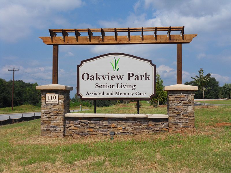 Entrance sign for Oakview Park Senior Living, offering assisted and memory care services.
