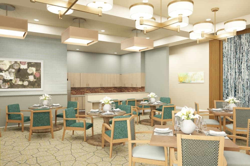A modern dining room with elegantly arranged tables and chairs.