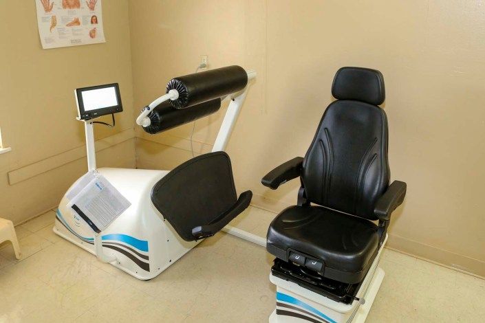 A specialized exercise machine used for rehabilitation and fitness therapy.