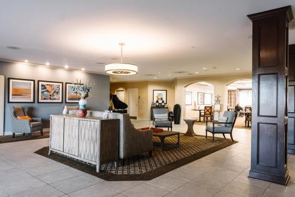 A stylish living room with modern furnishings and artwork.