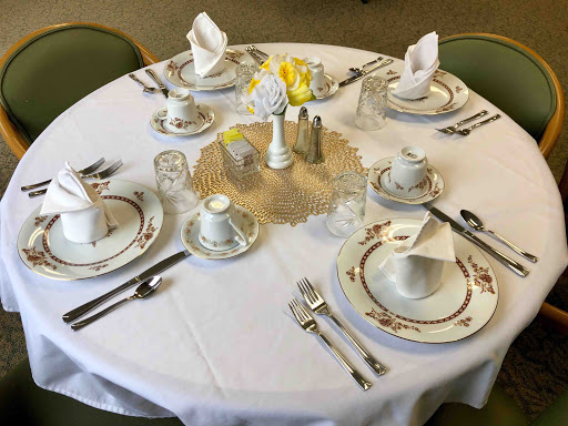 An elegantly arranged dining table, perfect for a formal meal.