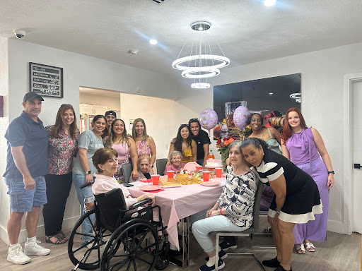 A joyful birthday celebration surrounded by friends and family.